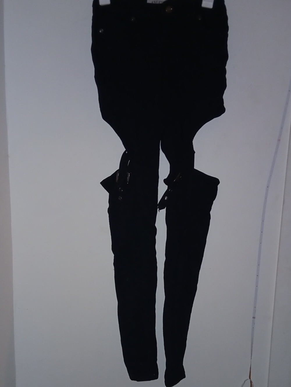 Angel black skinny jeans dramatic thigh cutouts adjustable buckle strap Size 5